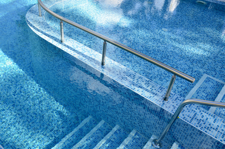 Steps into the pool.Turquoise water.の写真素材