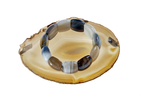 agate bracelet on a round agate,isolatedの写真素材