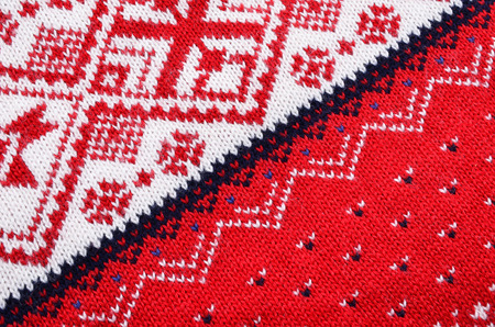 Macro red  knitting  fabric wool, material texture for background ,structure knitting の写真素材