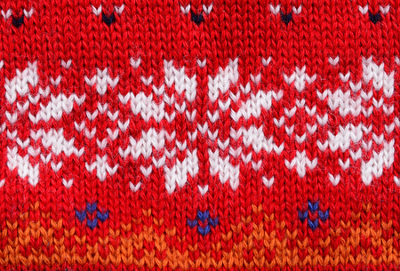 Macro red  knitting  fabric wool, material texture for background ,structure knitting の写真素材