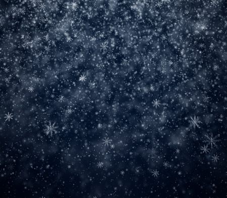 Frosty winter New Year's background, falling snowflakesの写真素材