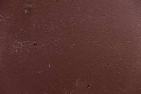 Old red paint with white cracks textureの写真素材