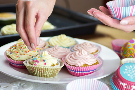 Christmas cupcakes on the wooden table