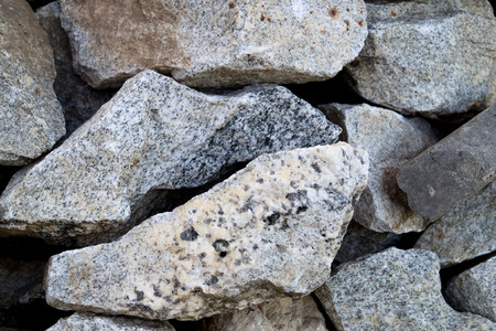Granite closeup. Pieces of granite lying bunch