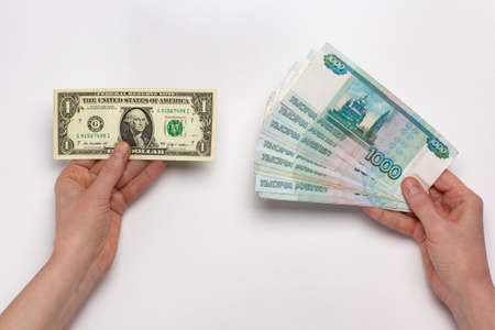 One US Dollar and one thousand Russian rubles. Money background.の写真素材