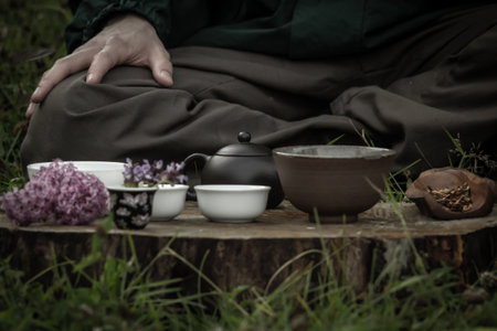 Close-up of traditional tea set for tea ceremony with clay pot and bawls.の写真素材