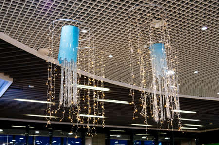 Magical Christmas winter decor with glowing blue garlands