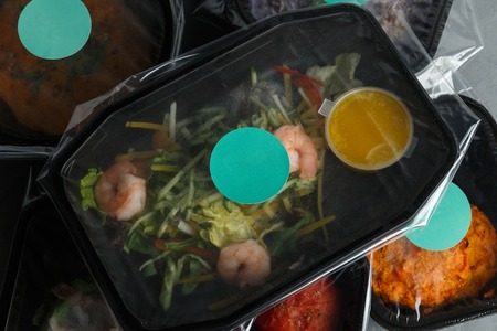 Set of dietary food in the containers on the concrete backgroundの写真素材