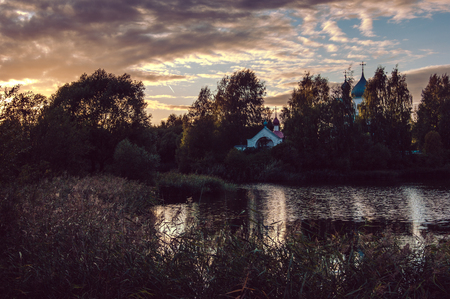 Monastery at the lake in the eveningの写真素材