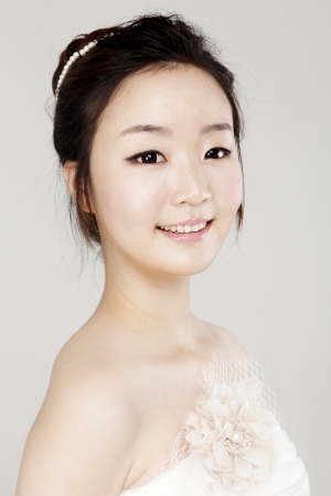 Lovely girl dressed in white short dressの写真素材