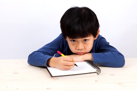 A portrait of a cute asian boyの写真素材