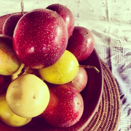 Well known with its exotic sweet and flourish fragrant with hint sour taste the fruits has various skin colours orange purple and yellow dependence from origin place.の素材
