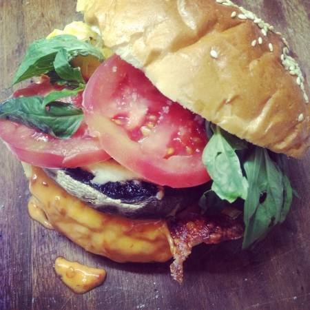 My home made veggie burger baked portobello mushroom with mozzarella fluffy scramble eggs organic beef tomato sweet basil and home made spicy belacan mayo sauce  の素材
