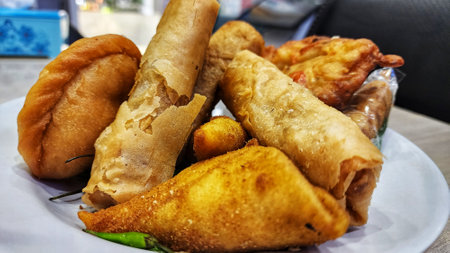 a photo of fried food served on the dining table