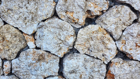Background of stone wall texture. Close-up image. Selective focus.