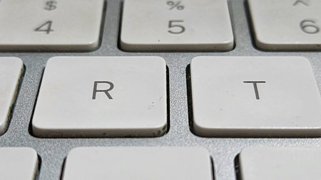 The word RTA written on the white button of a computer keyboardの写真素材