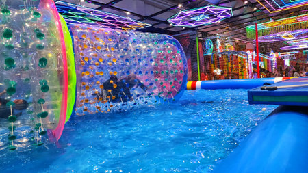 Indoor Water Obstacle Course with Neon Lights
