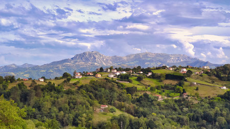 La Texuca village and Sierra de Penamayor in background, Siero and Nava municipalities, Asturias, Spain, Europeの写真素材