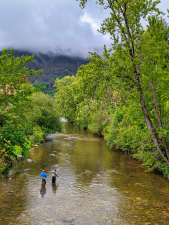 A fisherman fishing in the Piloの写真素材