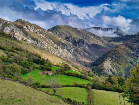 Meadows and mountains near Felechosa village, Aller, Asturias, Spainの写真素材