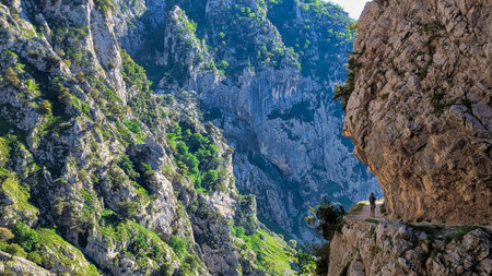People walking on the route of the Ruta del Cares Canyon, in the Picos de Europa National Park, between Asturias and Leon provinces, Spainの写真素材