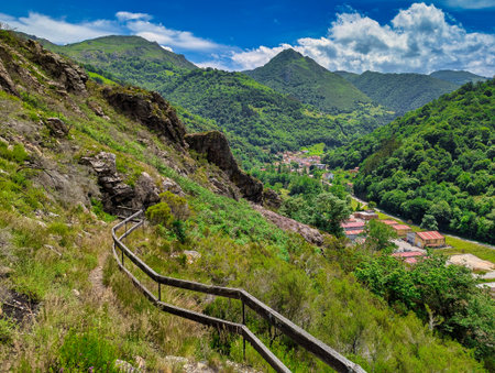 Salmones Arriba route, PR-AS 138, from Belmonte to San Cristobal villages, and Belmonte de Miranda i background, Asturias, Spainの写真素材