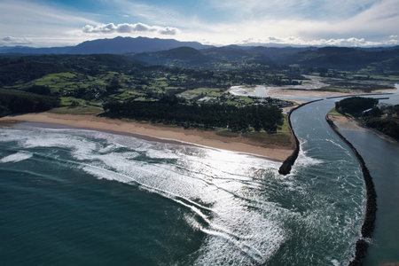 Rodiles Beach and the mouth of the Villaviciosa estuary, aerial view, Asturias, Spain