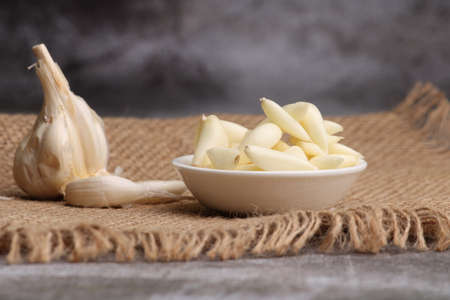 Raw garlic Cloves and Bulb. on barlup.