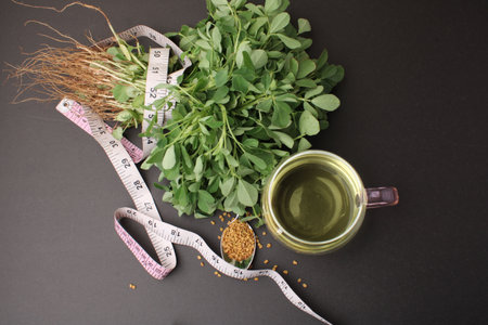 Close up of Fenugreek with its seeds and powder and the extracted water. It helps in numerous digestive problems etc.の写真素材