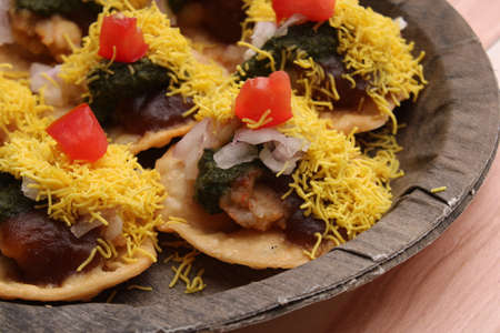Sev Batata Puri OR Papdi chat - popular indian snacks or street food.