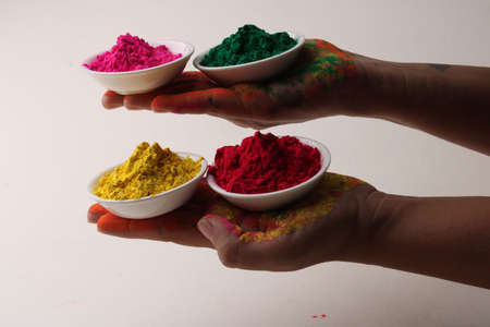 holi greetings view of hands with gulal for Hindu spring festival of coloursの写真素材