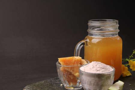 Raw Mango juice - Aam Panna or Panha in a transparent glass with whole green fruit,の写真素材