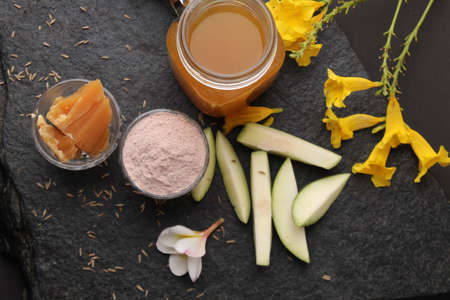 Raw Mango juice - Aam Panna or Panha in a transparent glass with whole green fruit,の写真素材