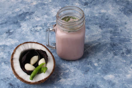 Solkadhi OR Kokum curry, A famous drink from Goa or Maharashtra`s Konkan region, served in a glass.の写真素材