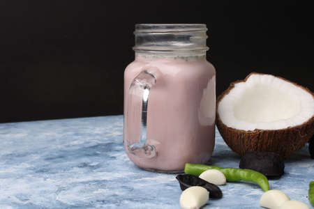 Solkadhi OR Kokum curry, A famous drink from Goa or Maharashtra`s Konkan region, served in a glass.の写真素材