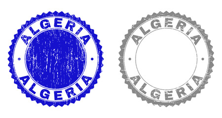 ALGERIA stamp seals with distress texture in blue and gray colors isolated on white background. Vector rubber imprint of ALGERIA text inside round rosette. Stamp seals with dirty styles.のイラスト素材