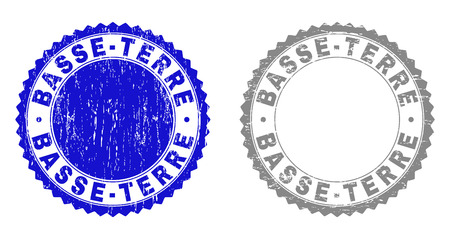 Grunge BASSE-TERRE stamp seals isolated on a white background. Rosette seals with grunge texture in blue and grey colors. Vector rubber watermark of BASSE-TERRE text inside round rosette.のイラスト素材