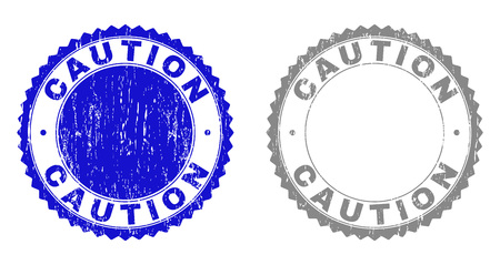 Grunge CAUTION stamp seals isolated on a white background. Rosette seals with grunge texture in blue and grey colors. Vector rubber watermark of CAUTION caption inside round rosette.のイラスト素材