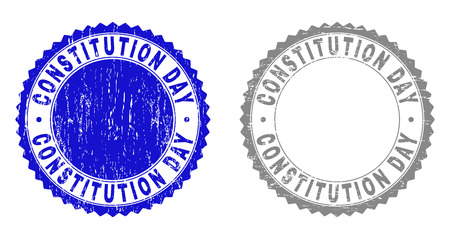 Grunge CONSTITUTION DAY stamp seals isolated on a white background. Rosette seals with grunge texture in blue and grey colors. Vector rubber watermark of CONSTITUTION DAY label inside round rosette.のイラスト素材