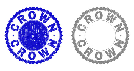 Grunge CROWN stamp seals isolated on a white background. Rosette seals with grunge texture in blue and grey colors. Vector rubber stamp imitation of CROWN text inside round rosette.のイラスト素材