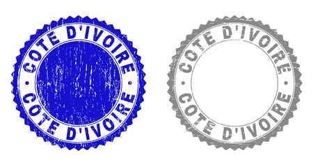 Grunge COTE D'IVOIRE stamps isolated on a white background. Rosette seals with grunge texture in blue and grey colors. Vector rubber stamp imitation of COTE D'IVOIRE title inside round rosette.のイラスト素材