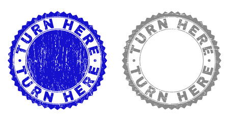 Grunge TURN HERE stamp seals isolated on a white background. Rosette seals with grunge texture in blue and gray colors. Vector rubber stamp imprint of TURN HERE text inside round rosette.のイラスト素材