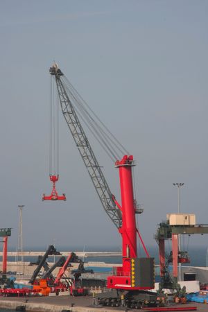 Red crane in the portの写真素材