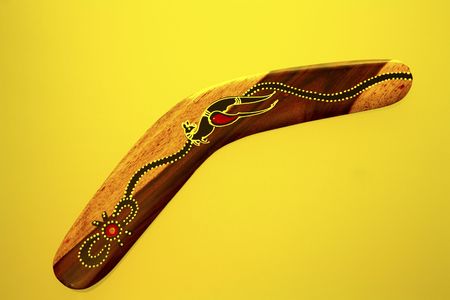 Boomerang on yellow back groundの写真素材
