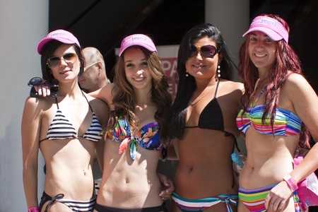 GOLD COAST, AUSTRALIA - OCTOBER 2: Unidentified participants marches in successful Guinness World Record longest bikini parade on October 2, 2011 in Gold Coast, Queensland, Australia. The record is now 357 women in bikinis. のeditorial素材
