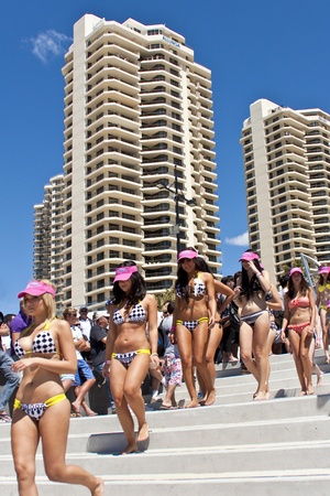 GOLD COAST, AUSTRALIA - OCTOBER 2: Unidentified participants marches in successful Guinness World Record longest bikini parade on October 2, 2011 in Gold Coast, Queensland, Australia. The record is now 357 women in bikinis. のeditorial素材