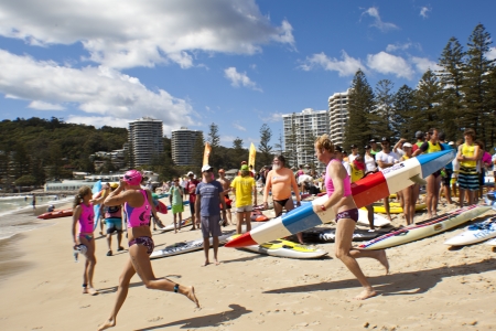GOLD COAST,  AUSTRALIA  - September 14 2012 : Unidentified  participant    in the Colangatta Gold life saver competition  having a drink of water  on Sept, 14, 2012 in Gold Coast Australia, .のeditorial素材