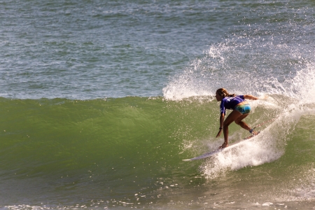 BREAKA BURLEIGH PRO 2013 , GOLD COAST, AUSTRALIA - FEB 3: Unidentified professional female surfer...