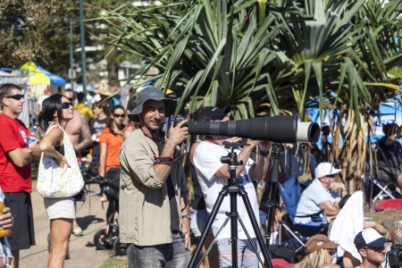 BREAKA BURLEIGH PRO 2013 , GOLD COAST, AUSTRALIA - FEB 3: Unidentified professional photographer shooting at the Burleigh Pro 2013 surfer championship February 3, 2013 , Gold Coast, Australia のeditorial素材