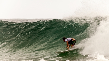 SNAPPER ROCKS, GOLD COAST, AUSTRALIA - 9 MARCH  Unidentified Surfer races the Quiksilver   Roxy Pro...